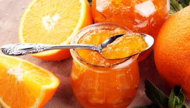 orange homemade jam marmelade in a glass jar. fresh juicy jelly